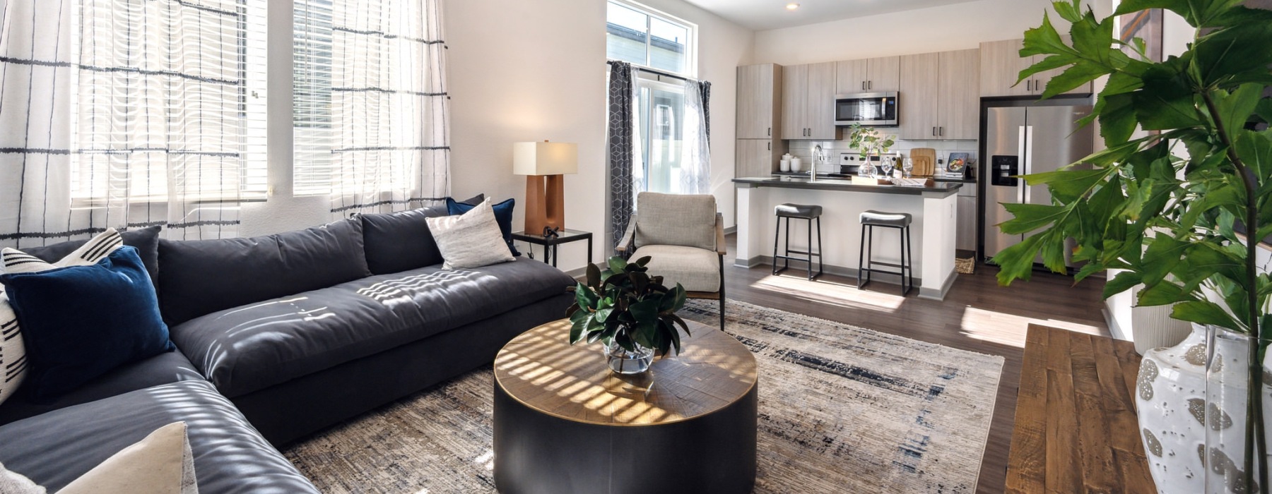 a living room with a couch and a table