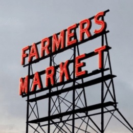 a farmers market sign