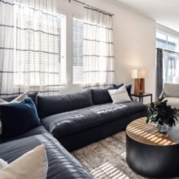 a living room with a couch and a coffee table