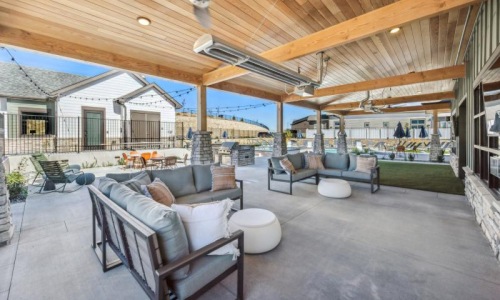a patio with couches