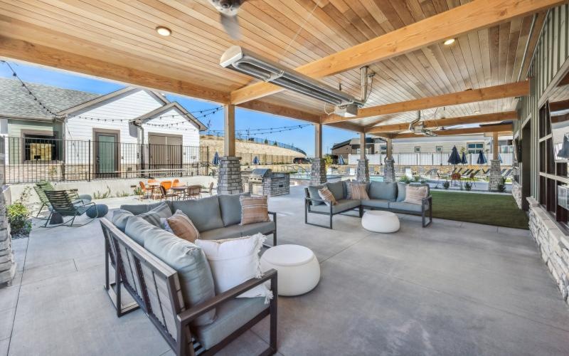 a patio with couches