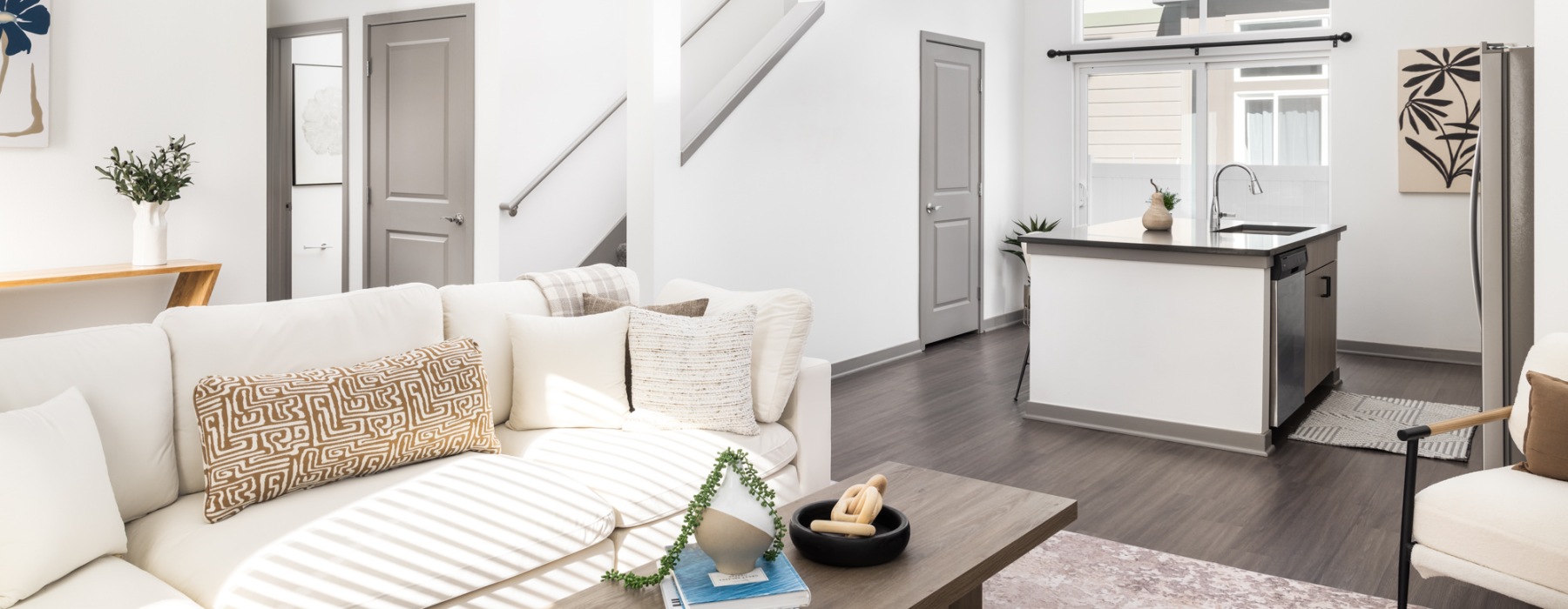 a living room with a couch and coffee table